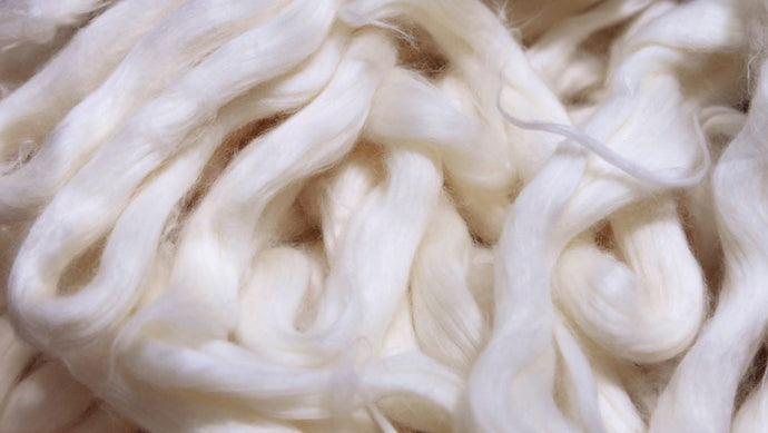 Toward spinning greener advanced silk fibres by feeding silkworms with nanomaterials