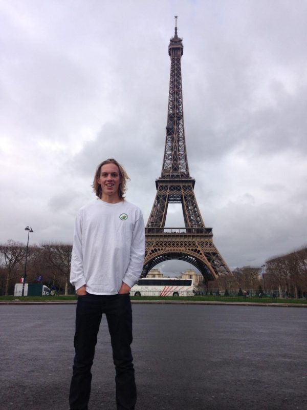 Long sleeve shirt in front of the Eiffel Tower